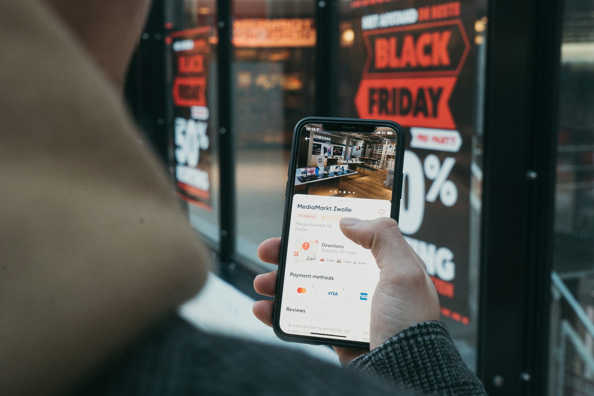 A shopper browsing an online store on a smartphone.